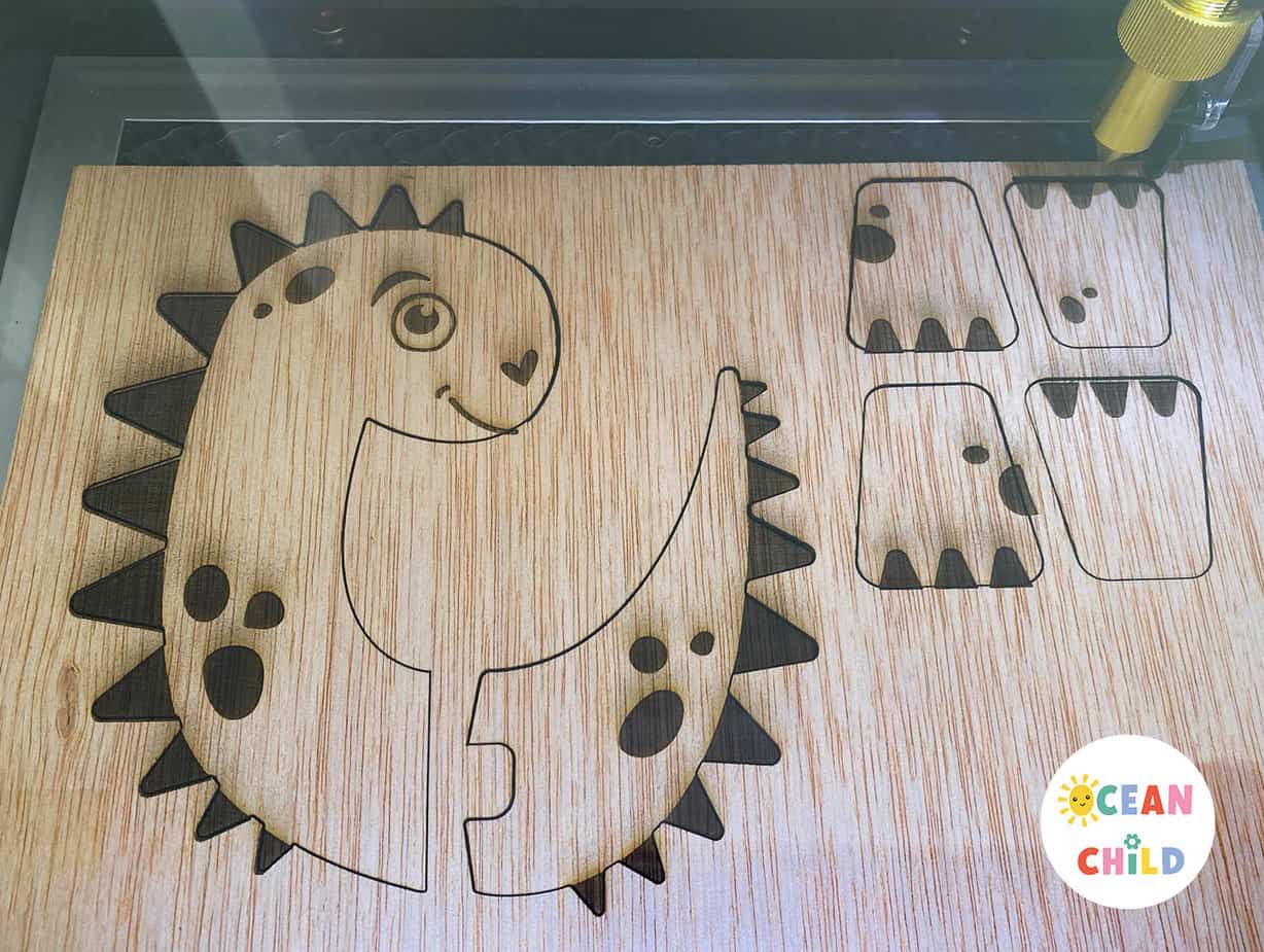 Pinecone dinosaurs for fall, a FLUX laser cuter craft and a gift idea! Ocean Child Crafts