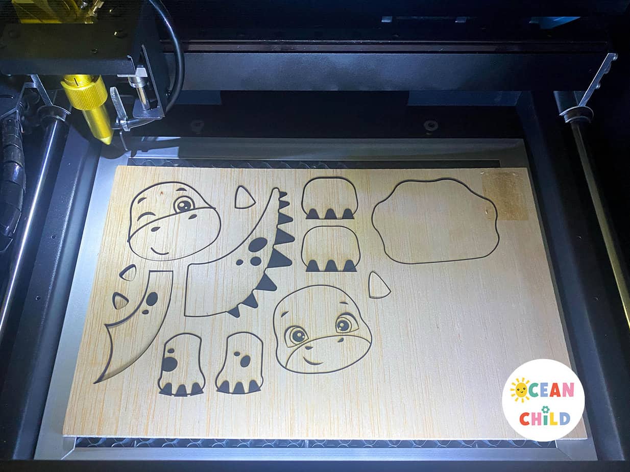 Pinecone dinosaurs for fall, a FLUX laser cuter craft and a gift idea! Ocean Child Crafts