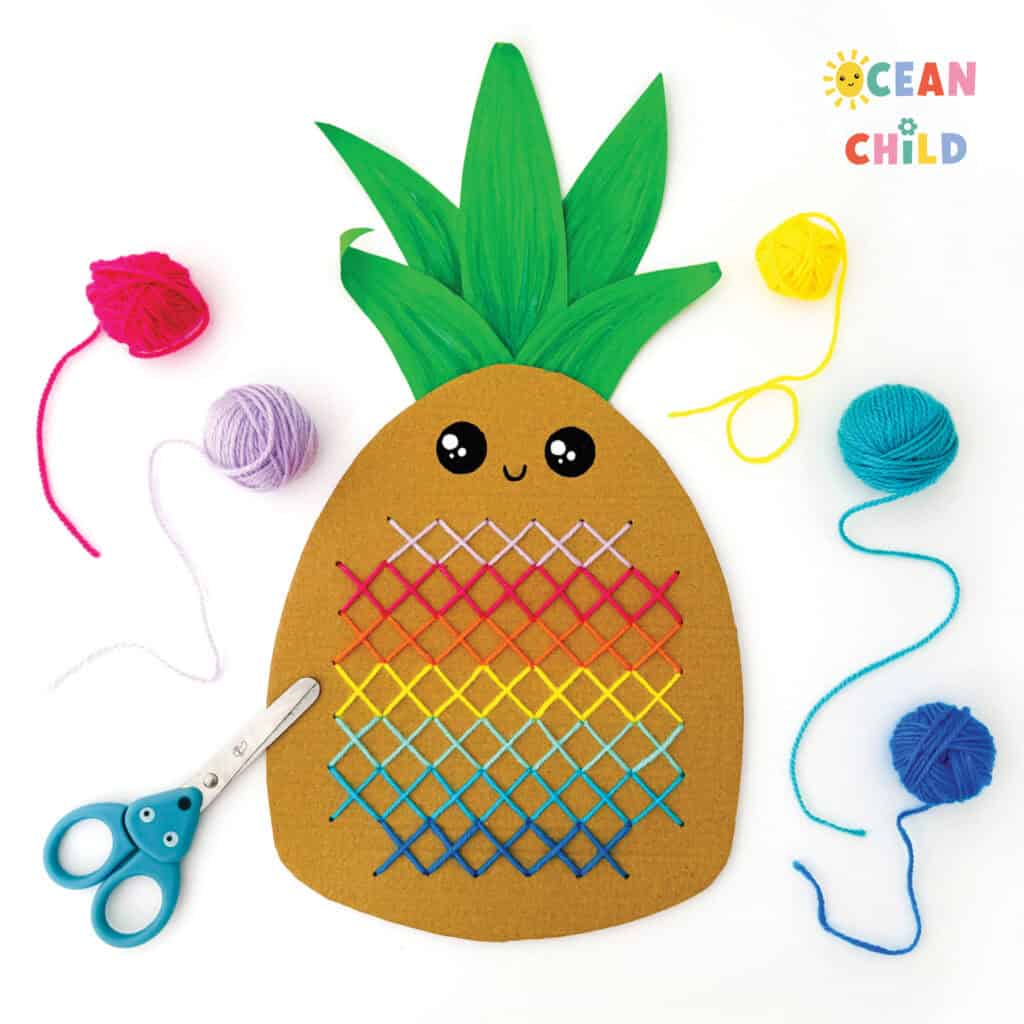 DIY pineapple yarn craft finished with cute stitched X pattern